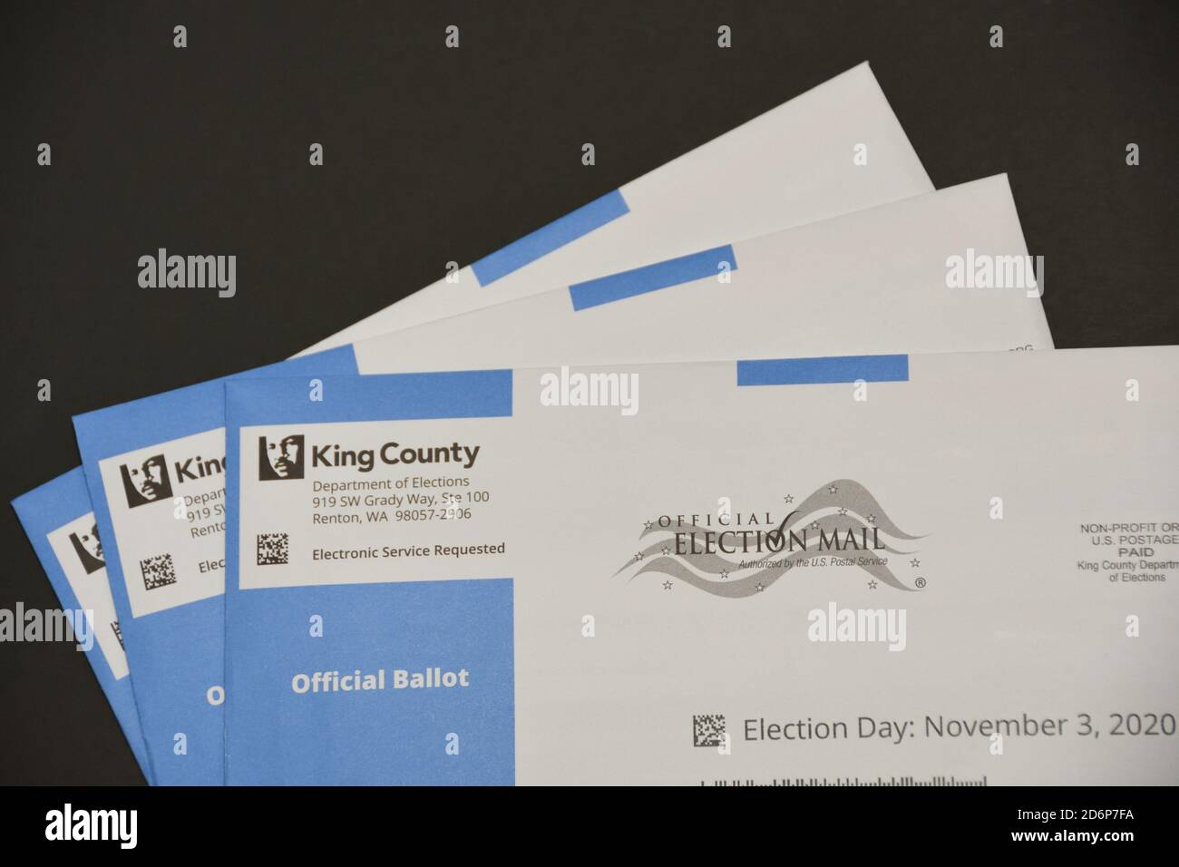 Vote by mail King County General Election November 2020 Ballots in WA, USA . Black background. Copy space. Top view. Stock Photo