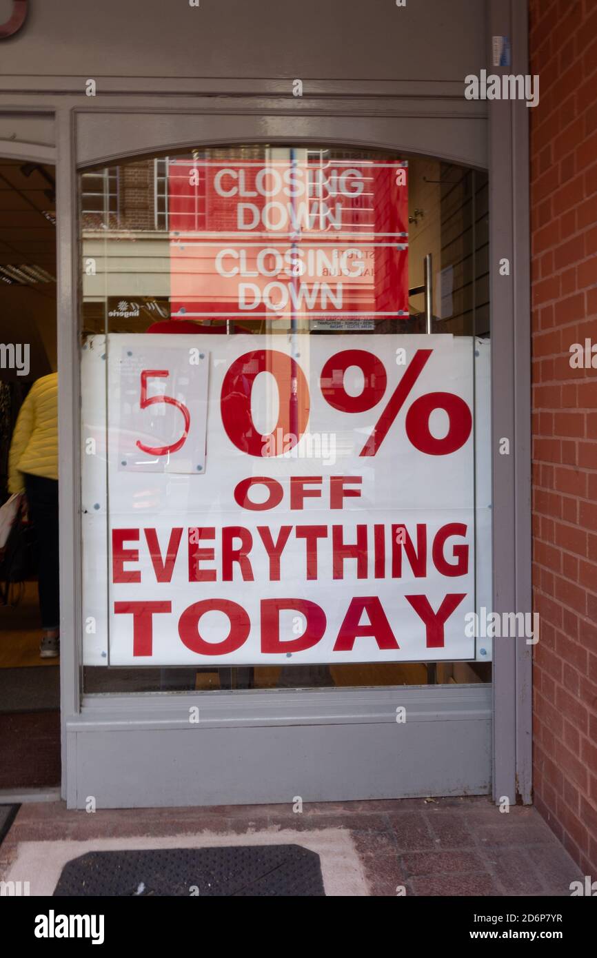 Closing down sale posters in shop window in Stourbridge High Street. September 2020. West Midlands. Black Country. UK Stock Photo