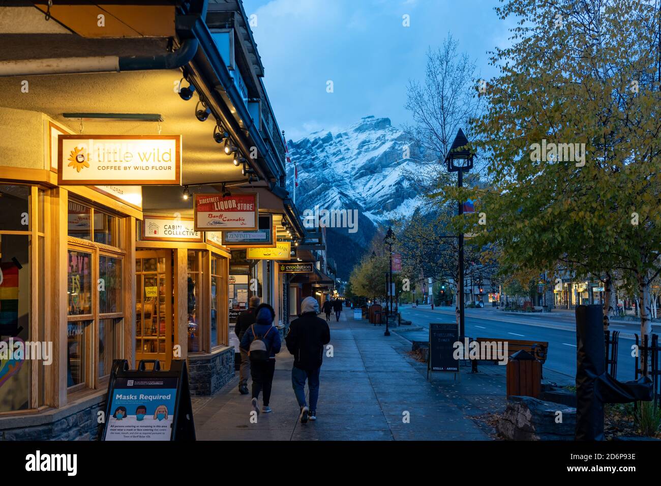 Street view of Banff Avenue in autumn and winter season night during covid-19 pandemic period. Banff, Alberta, Canada Stock Photo