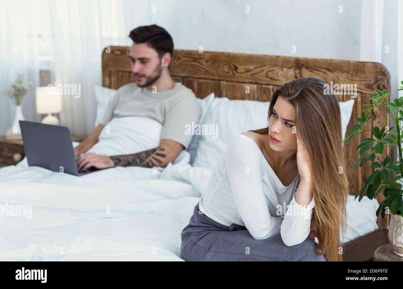 Relationship, problems, a lot of work and virtual treason Stock Photo