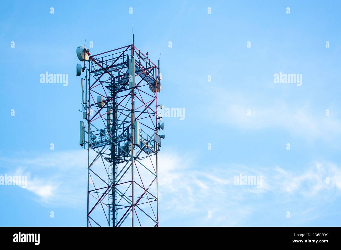 transmission tower built high under the blue Stock Photo