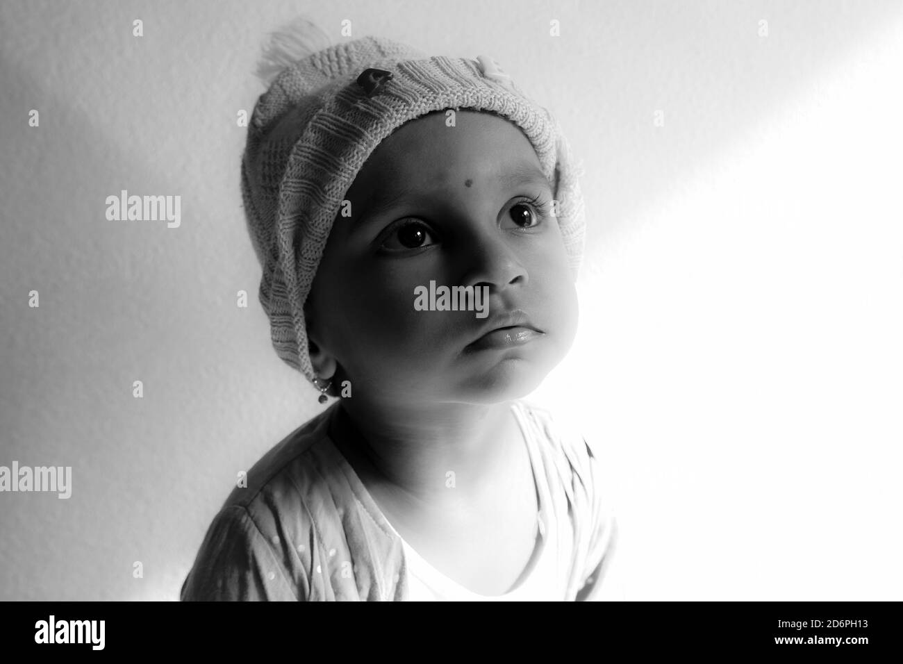 Indian girl wearing black cap Black and White Stock Photos & Images - Alamy