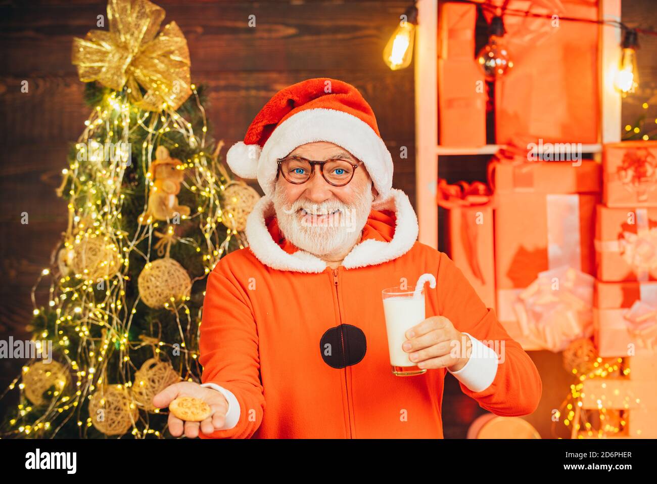 Portrait of bearded funny man in Santa costume. Merry Christmas and
