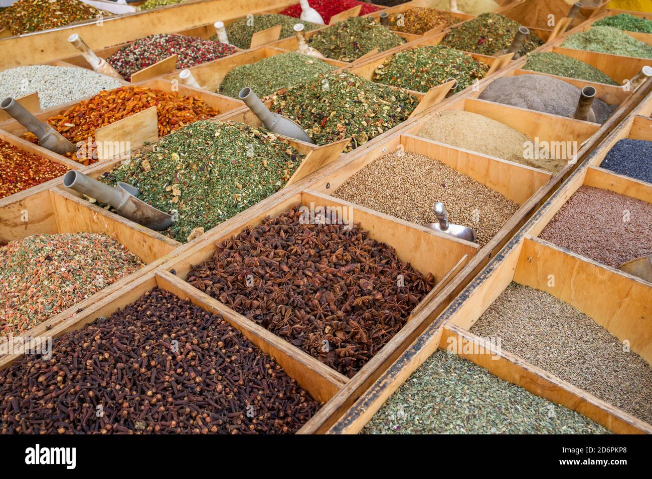 Wide variety of spices on a street market stall in Sicily, Italy Stock Photo