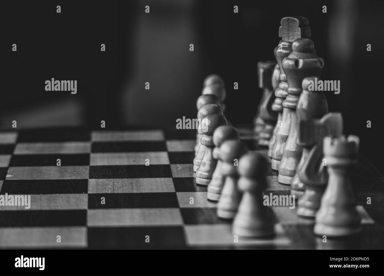 Wooden chess on the chessboard. Selective focus. Stock Photo