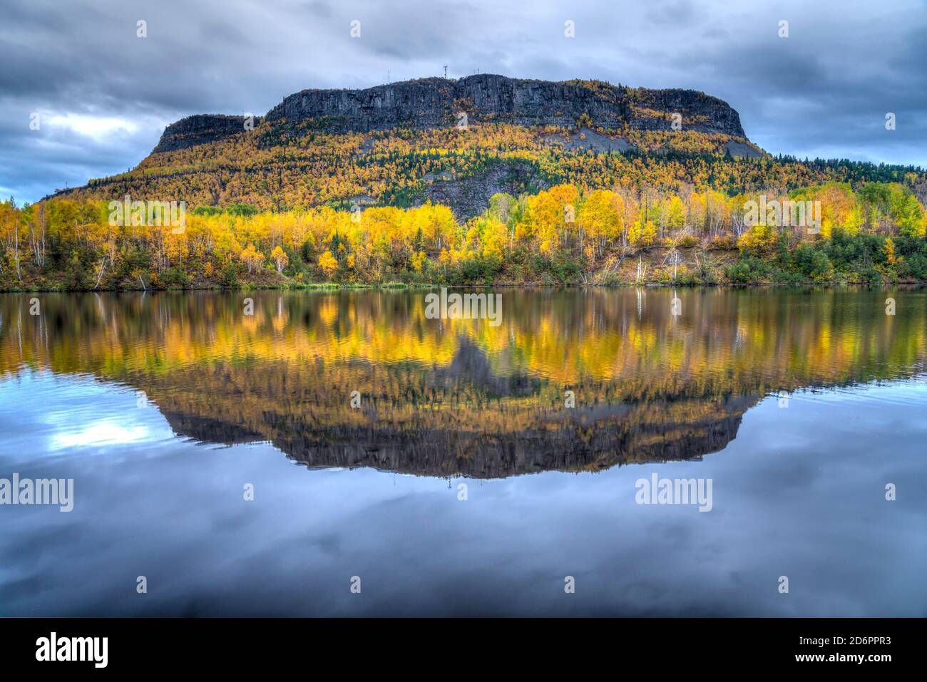Mount McKay with fall foliage color reflected in the Kaministiquia River near Thunder Bay, Ontario. Stock Photo