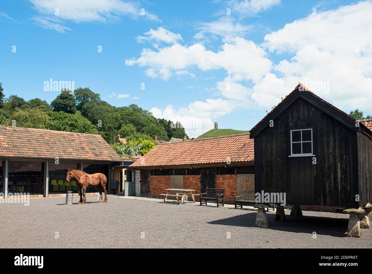 Museum Farmyard. Somerset Rural Life Museum Courtyard, Glastonbury, England. Punch, life-sized horse sculpture made of reclaimed metal. Harriet Mead. Stock Photo