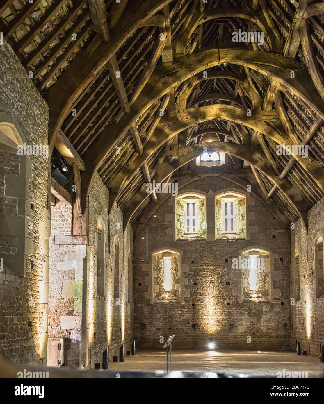 Interior view, Glastonbury, England. Somerset Rural Life Museum. Also known as Abby Barn. Medieval Architecture. No people. Cruck (curved) trusses. Stock Photo