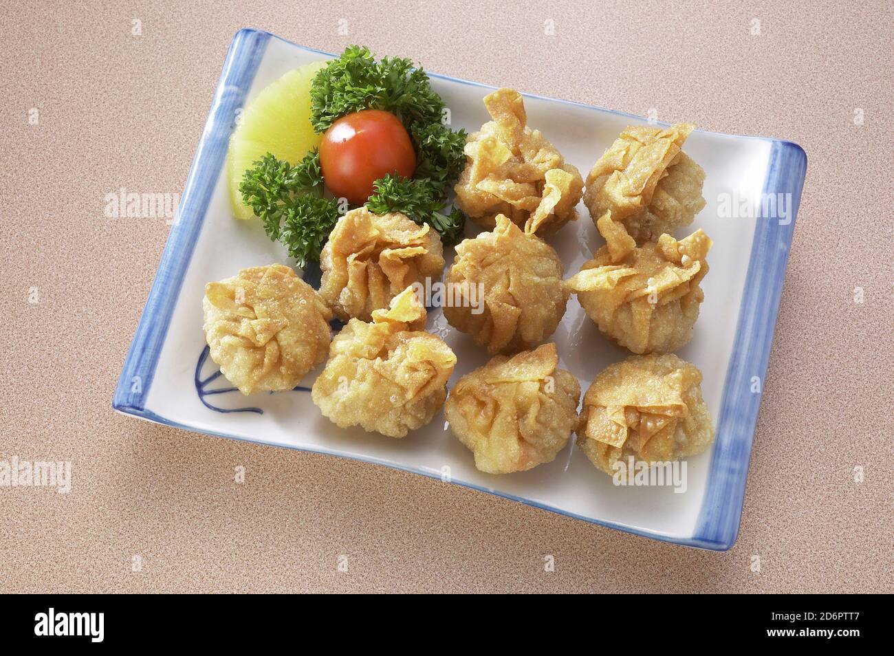 Deep fried wonton stuffed meat dumpling Stock Photo Alamy