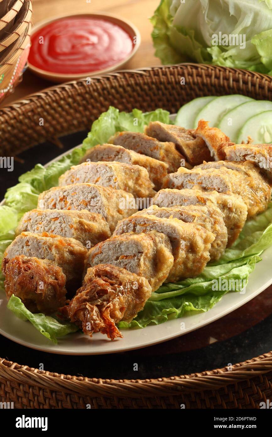 Asian food deep fried spring rolls with sauce Stock Photo