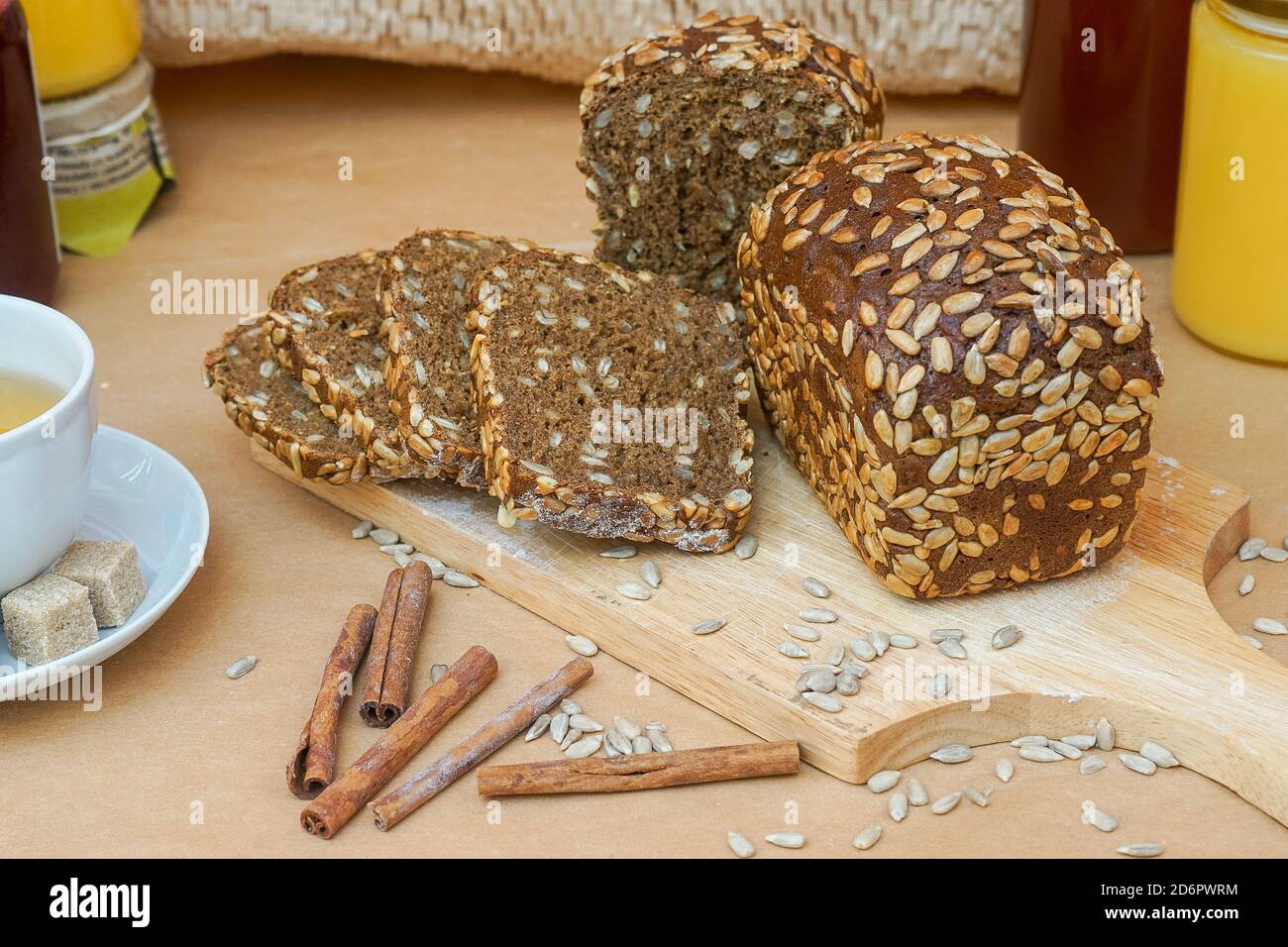 Grain baked brean on wooden board  Stock Photo