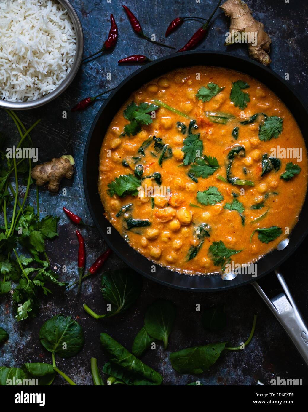 Indian chickpea spinach curry Stock Photo Alamy