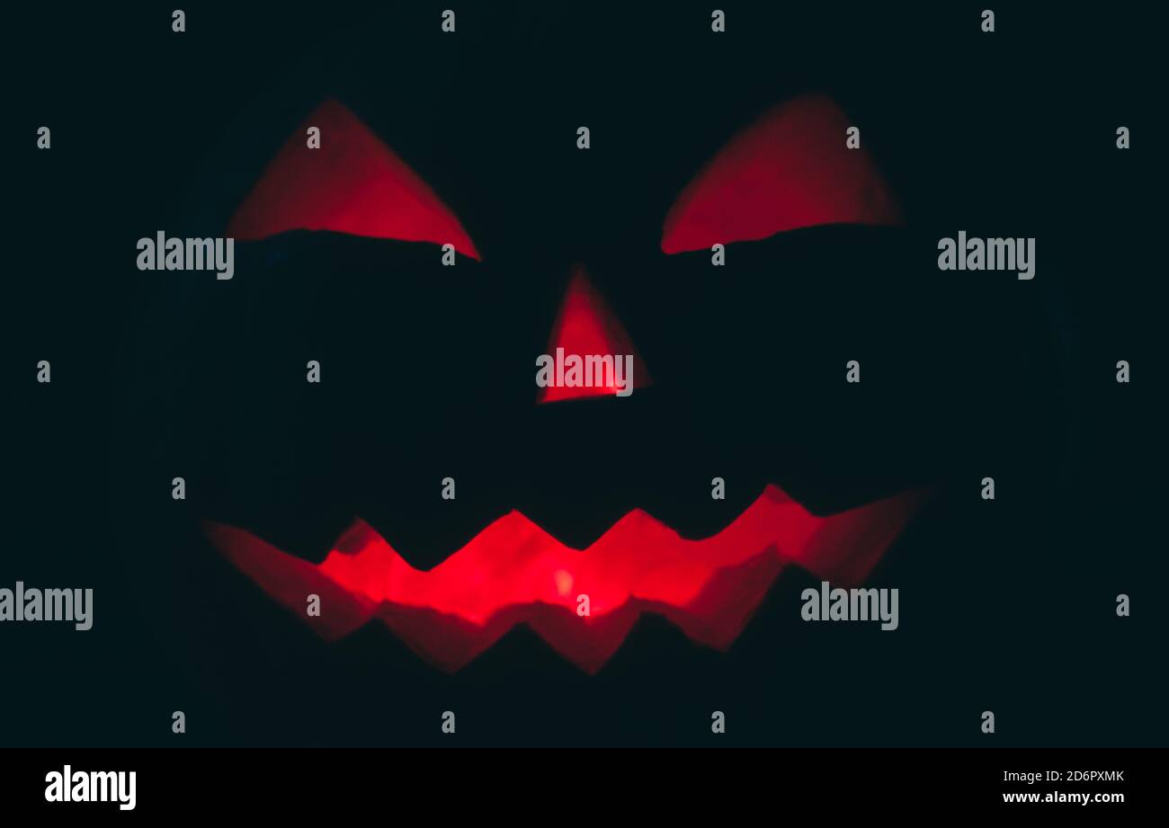 Jack o lantern in the dark, red eyes Stock Photo Alamy