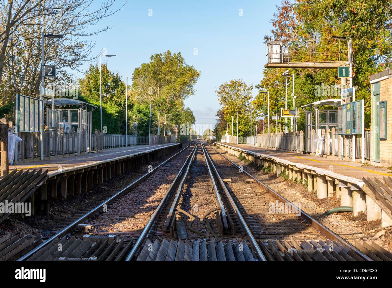 a deserted rural country rail or train station during the covid 19 pandemic. Stock Photo