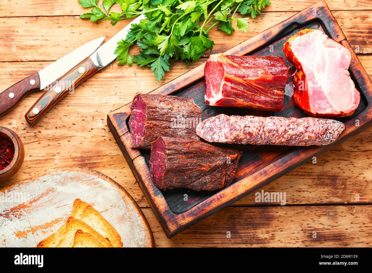Spanish meat platter.Cured meat and sausages on cutting board Stock