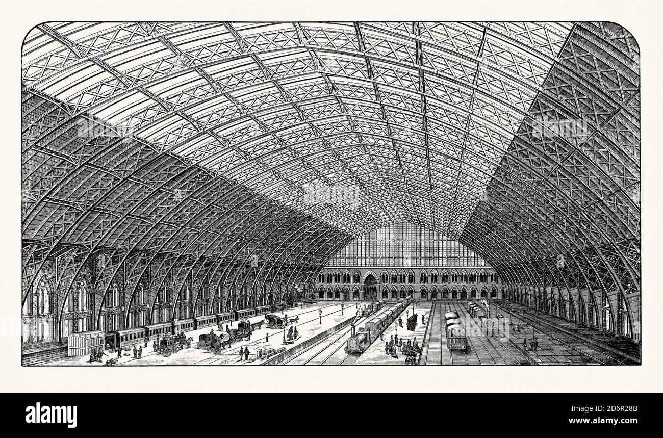 An old engraving of St Pancras railway station, London, England, UK. It is from a Victorian mechanical engineering book of the 1880s and it shows the huge roof space above the platforms. The station was constructed by the Midland Railway (MR), which had an extensive rail network across the Midlands and the North of England, but no dedicated line into London. The company decided to build a connection from Bedford to London with their own terminus. The station was designed by William Henry Barlow and constructed with a single-span iron roof. Stock Photo