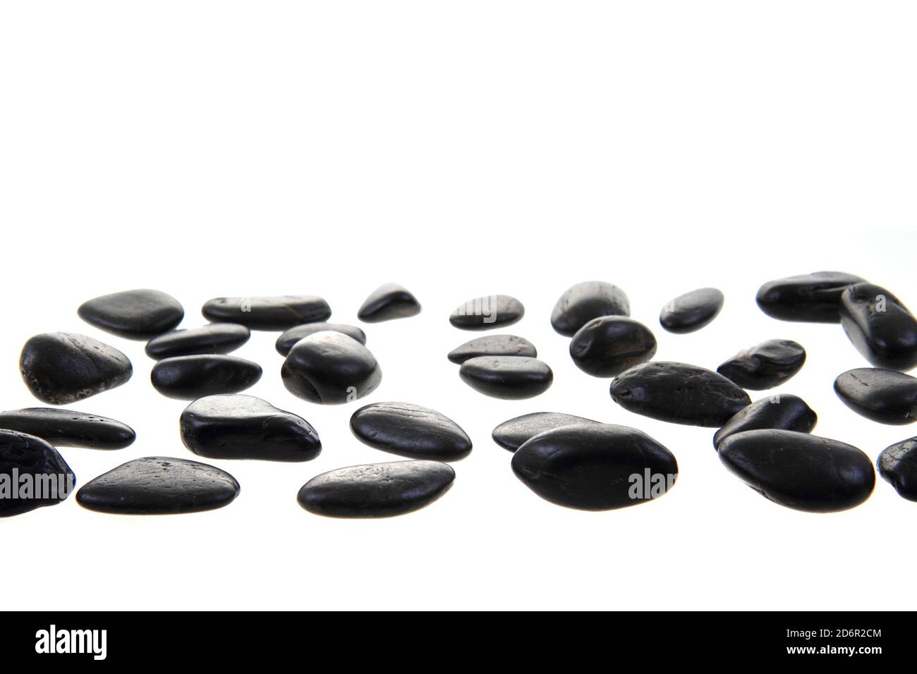 black stones isolated on the white background Stock Photo Alamy