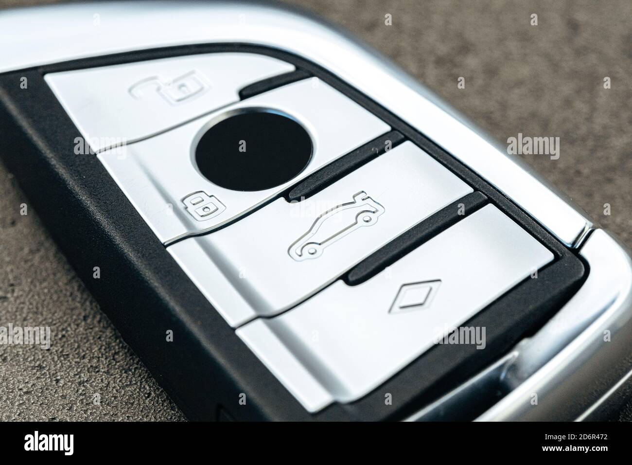 Modern automobile car key on black concrete background Stock Photo