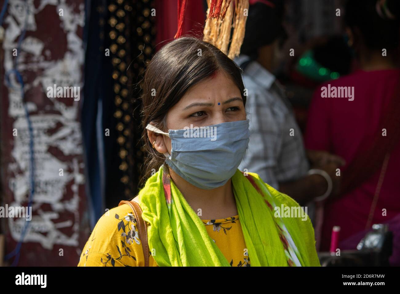 Dehradun, Uttarakhand/India-October 14 2020:Beautiful Indian lady wearing face mask in Corona epidemic in India. . High quality photo Stock Photo