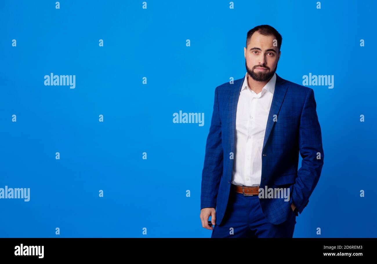 A business man posing in a blue suit hi-res stock photography and ...