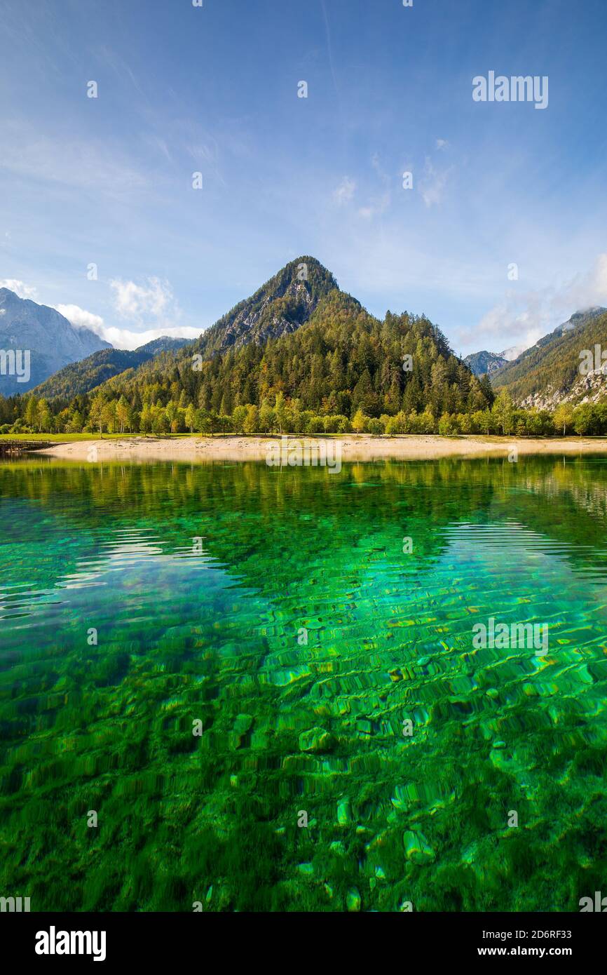 crystal clear lake Jasna with mountains in background Stock Photo