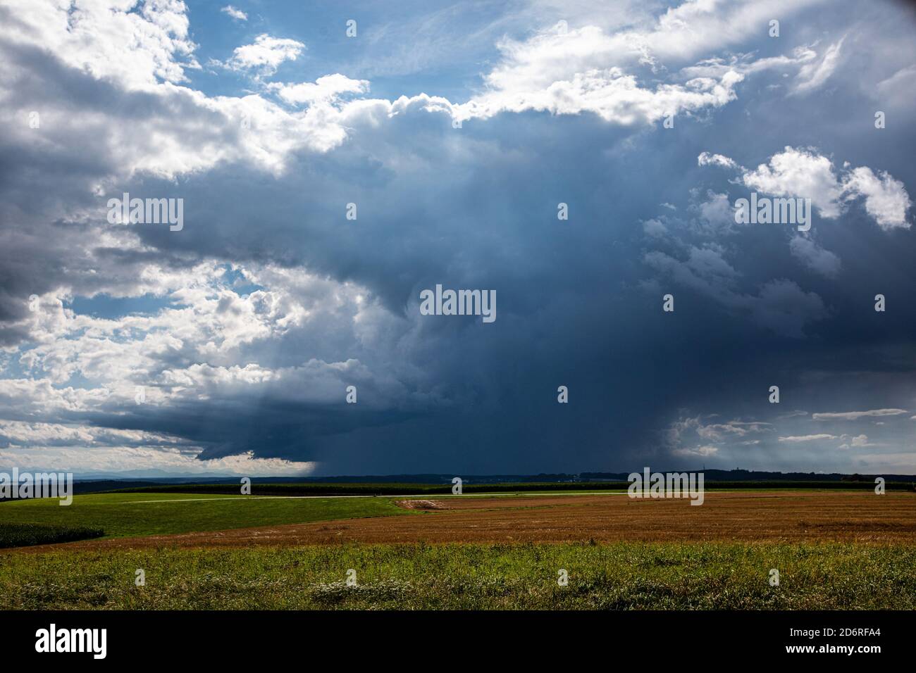 cumulonimbus cloud with downpour over the foothills of the Alps, Germany, Bavaria, Voralpenland, Haag Stock Photo