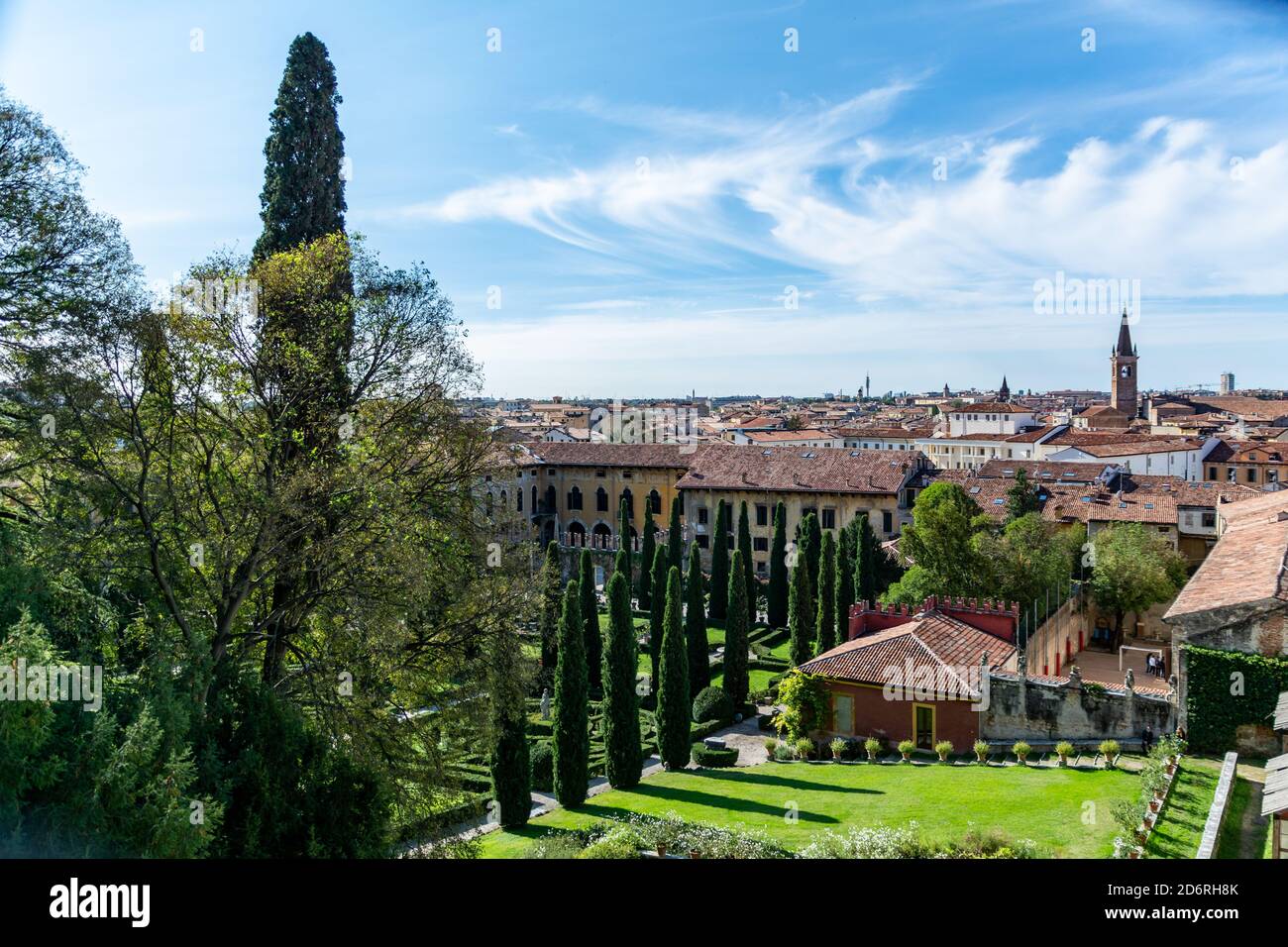 Beautiful view of Giusti gardens and look out over Italian city Verona. Trees and flowers in front of Verona skyline and houses. No people Stock Photo