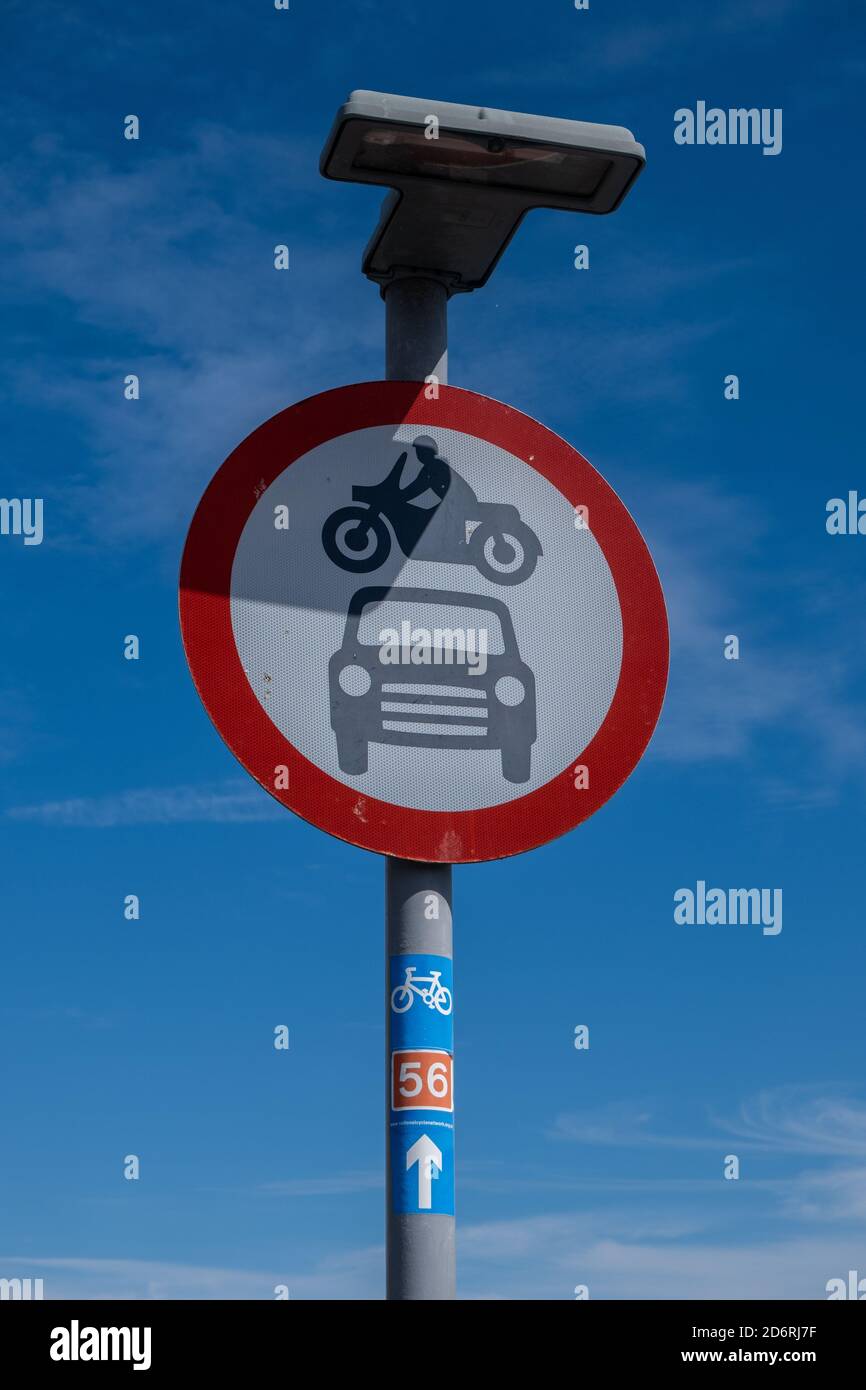 Red circular sign prohibiting motorbikes and cars Seacombe Wirral July 2020 Stock Photo