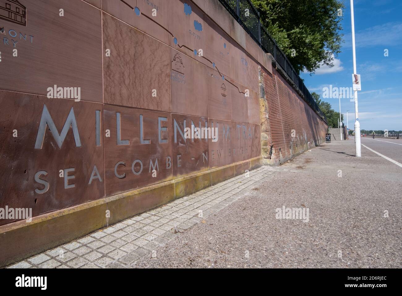 Millenium trail marker on wall Seacombe Wirral July 2020 Stock Photo