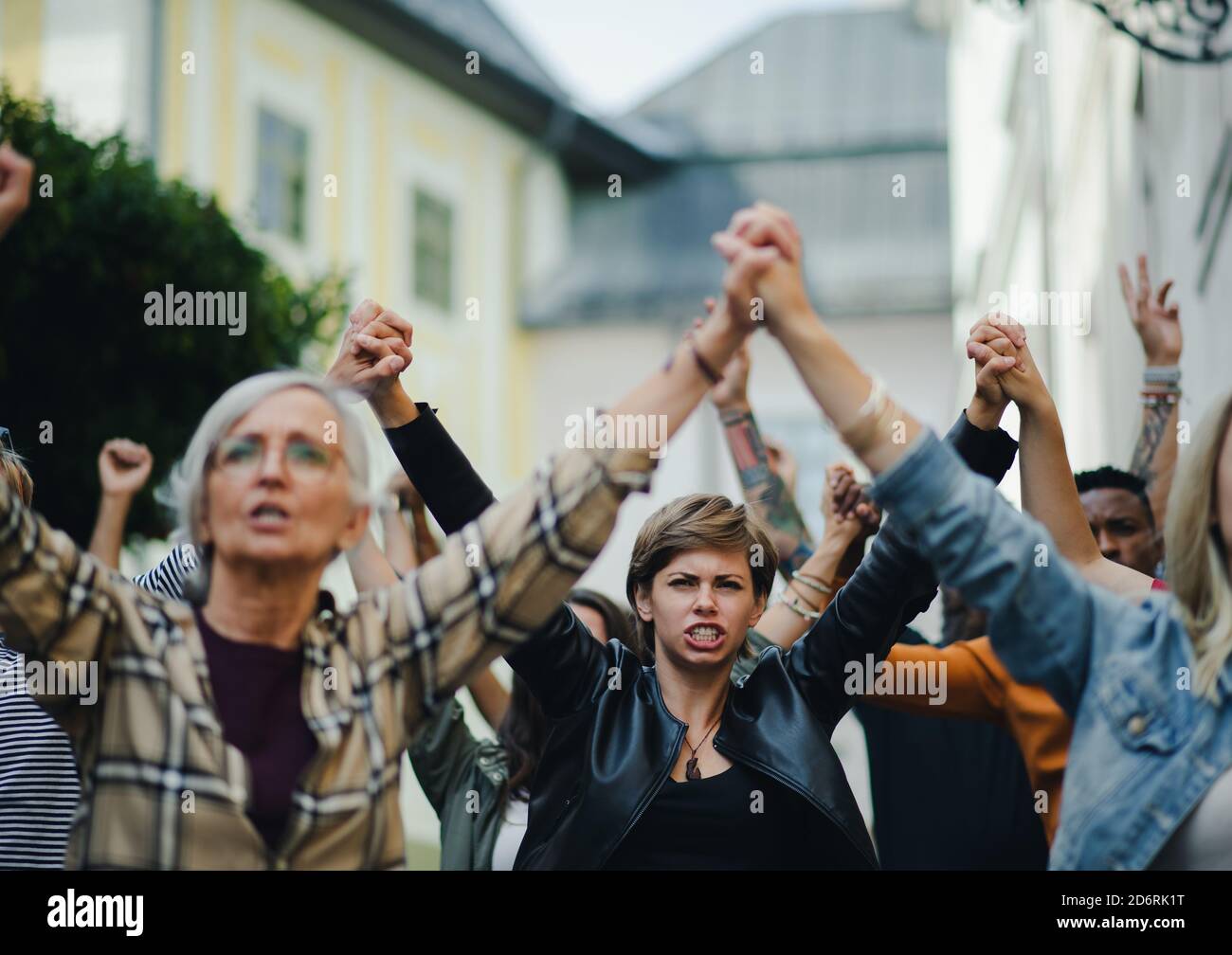 Group of people activists protesting on streets, women march and ...