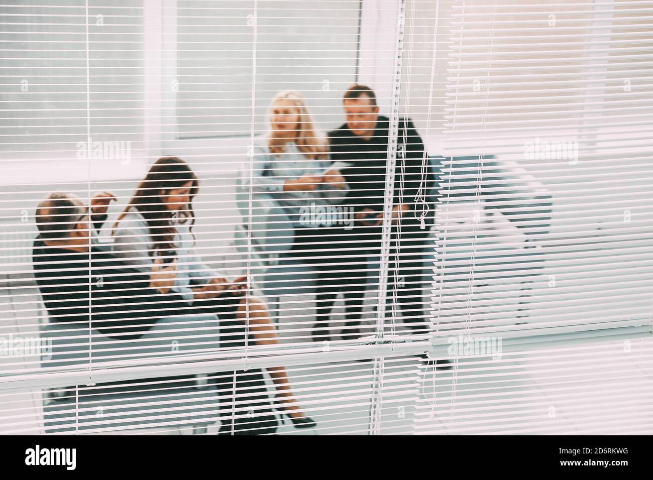 business people sitting in the office lobby Stock Photo - Alamy