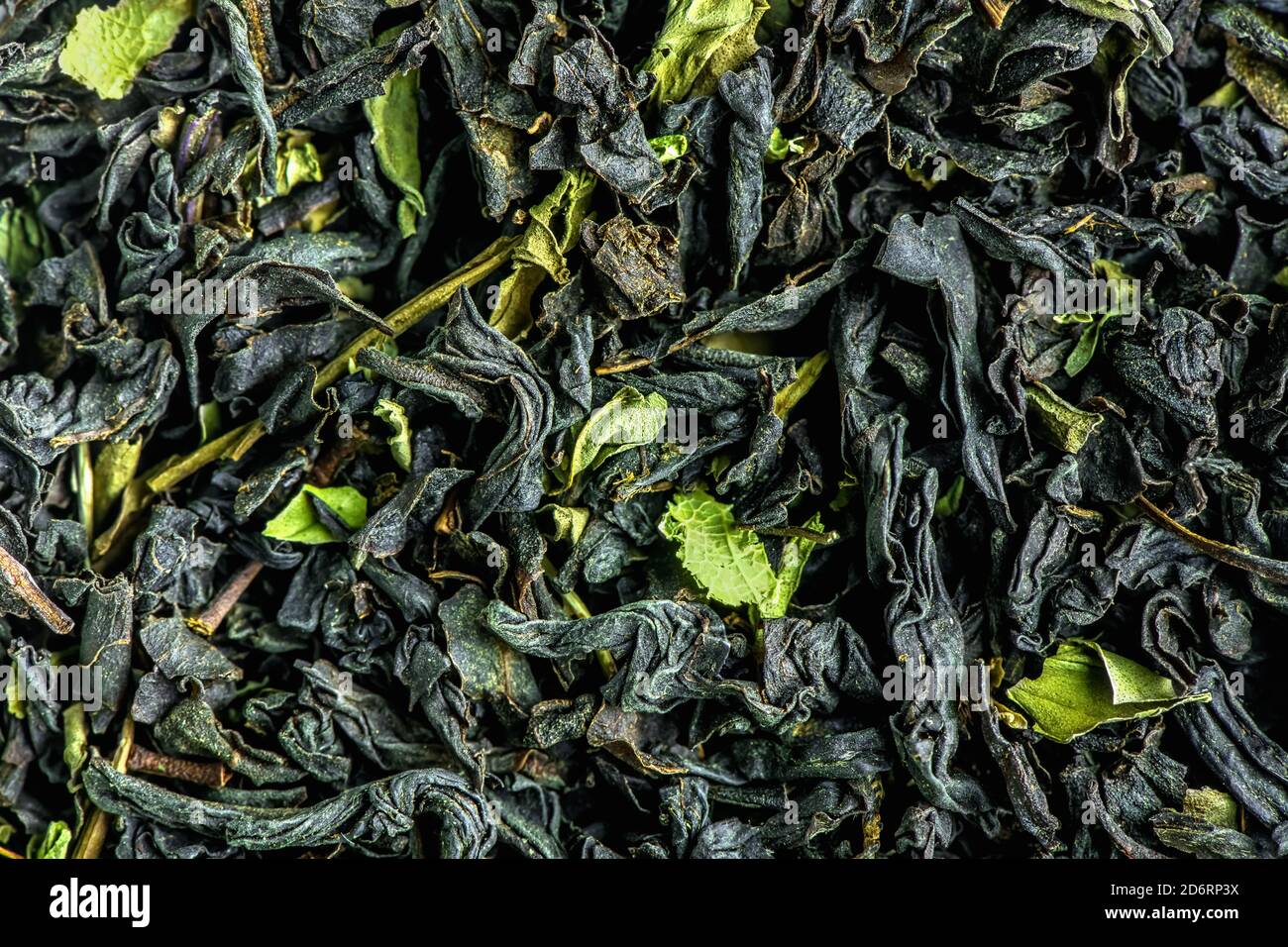 Black largeleaf tea as a background. Texture of dry black tea leaves Stock Photo Alamy