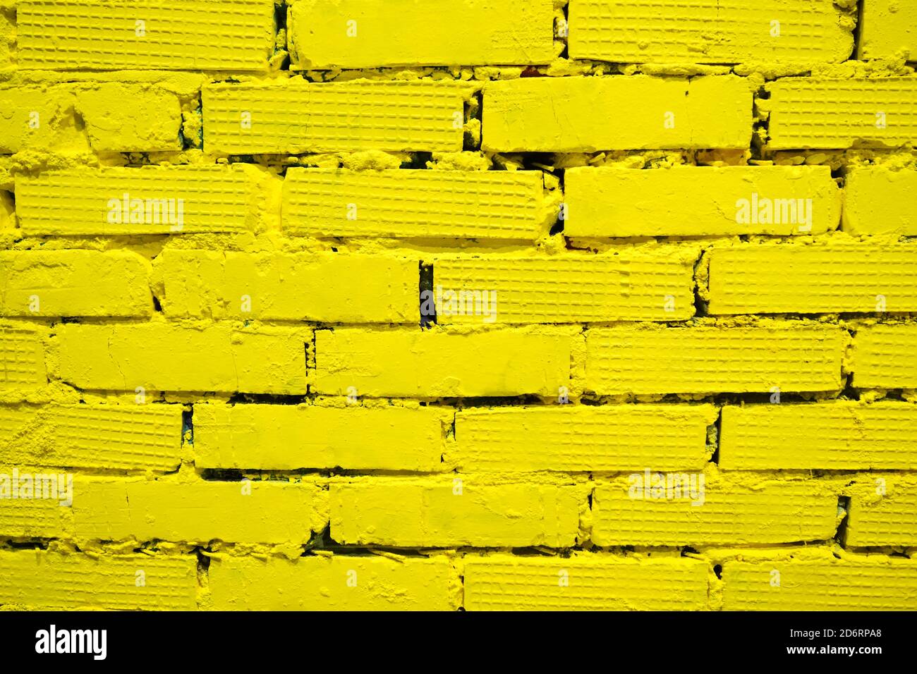 yellow brick wall for background and texture Stock Photo