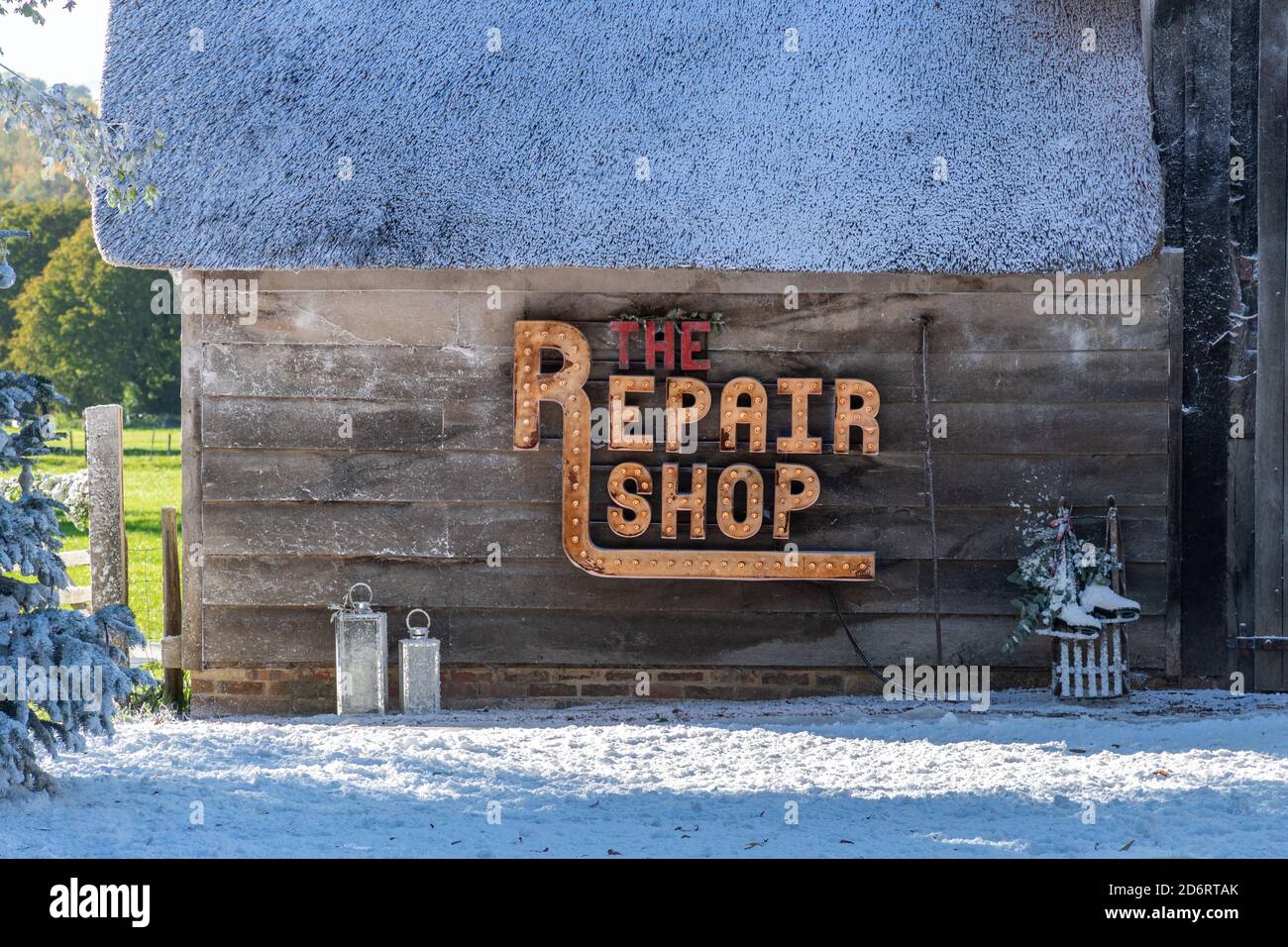 Filming a Christmas episode of BBC television series The Repair Shop in West Sussex, UK, with fake snow covering the scene Stock Photo