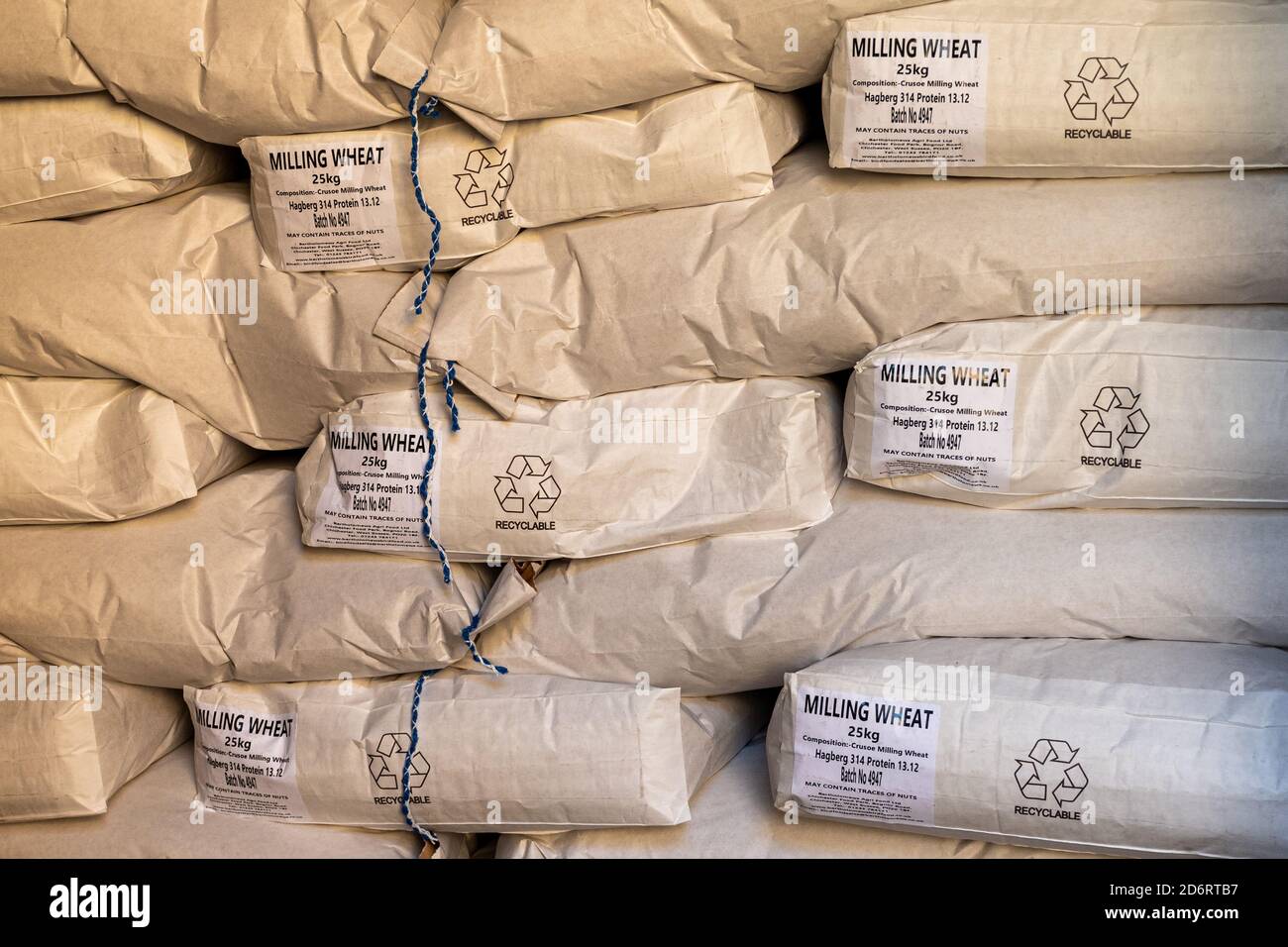 Bags of milling wheat stored in a granary Stock Photo