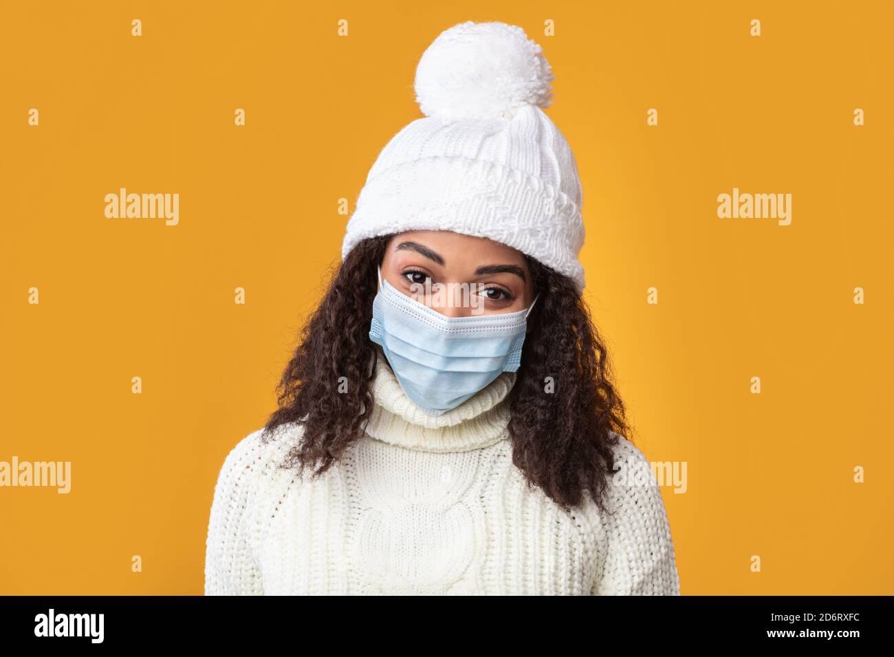 Portrait of a young black woman in medical mask Stock Photo - Alamy