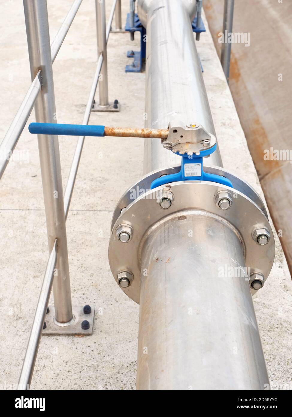 Steel water pipes and air tubes at waste water tanks. Town industrial wastewater treatment. Air and water installation Stock Photo