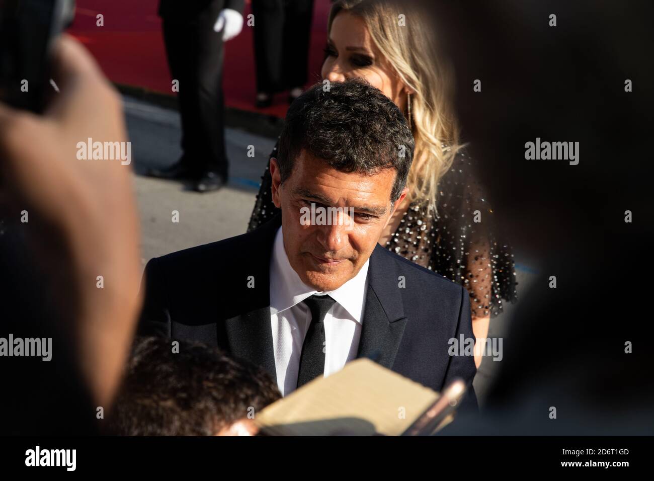 CANNES, FRANCE - May 25, 2019: Antonio Banderas arrives at the red carpet in Cannes and signs photos and takes pictures with his fans. Stock Photo