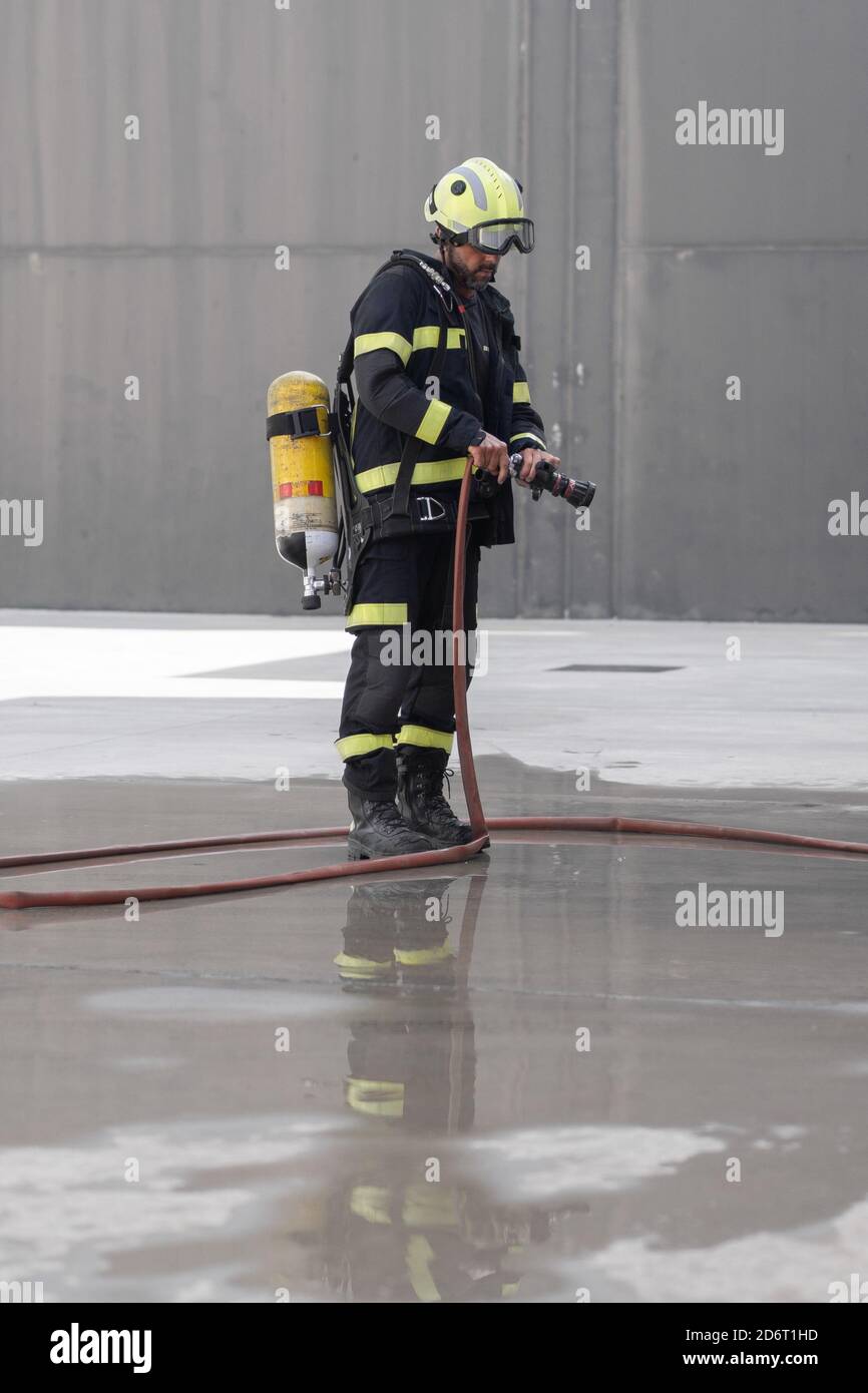 Rubber fire hose hires stock photography and images Alamy