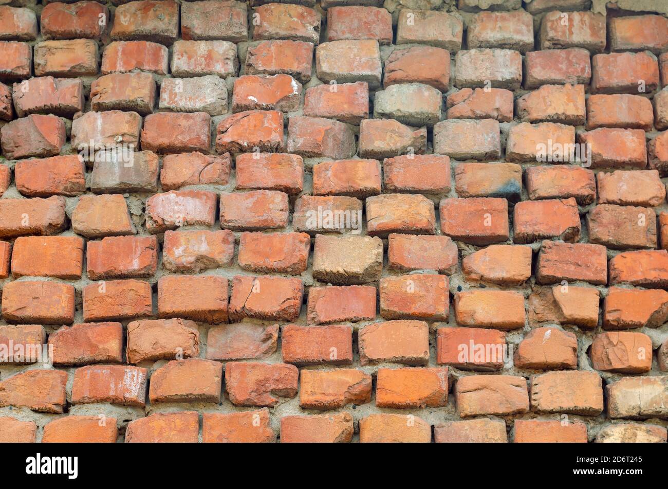 Geometric composition of rectangular clay bricks. Red brick wall ...