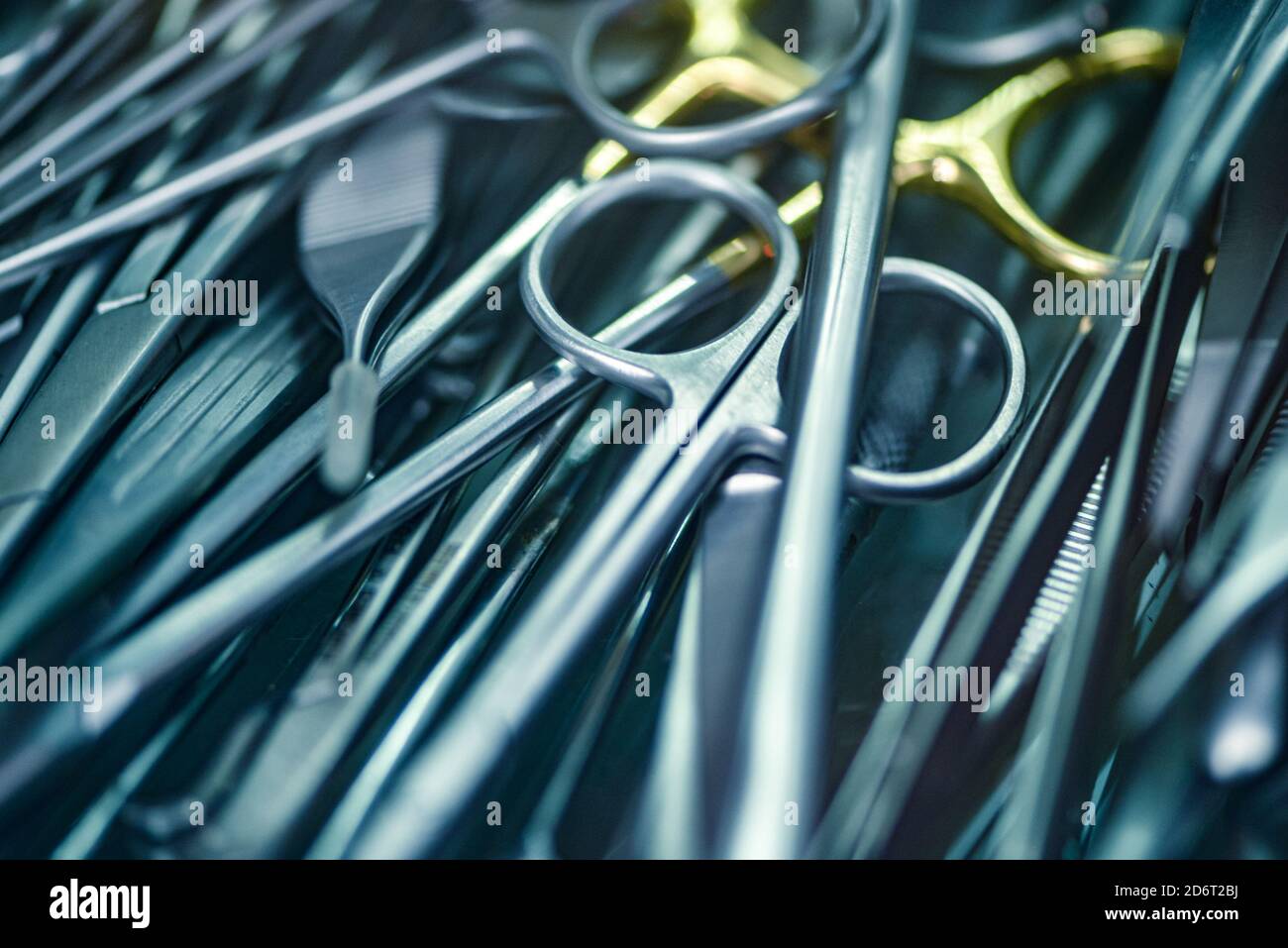 Pile of surgical instruments scalpels scissors clamps forceps Stock