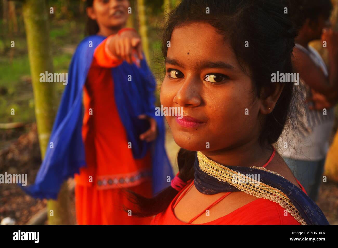 Close up of a teenage girl wearing traditional Bengali dress and