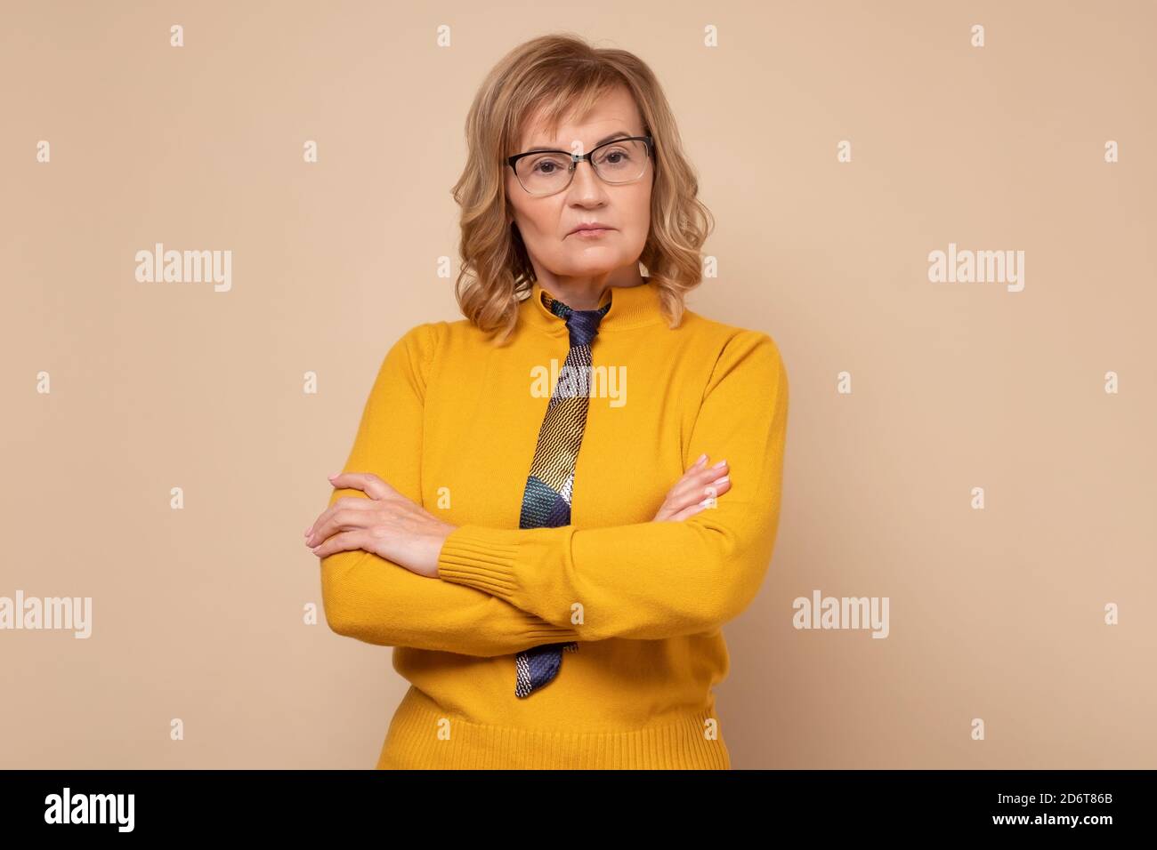 Serious pretty mature woman in hi-res stock photography and images - Alamy