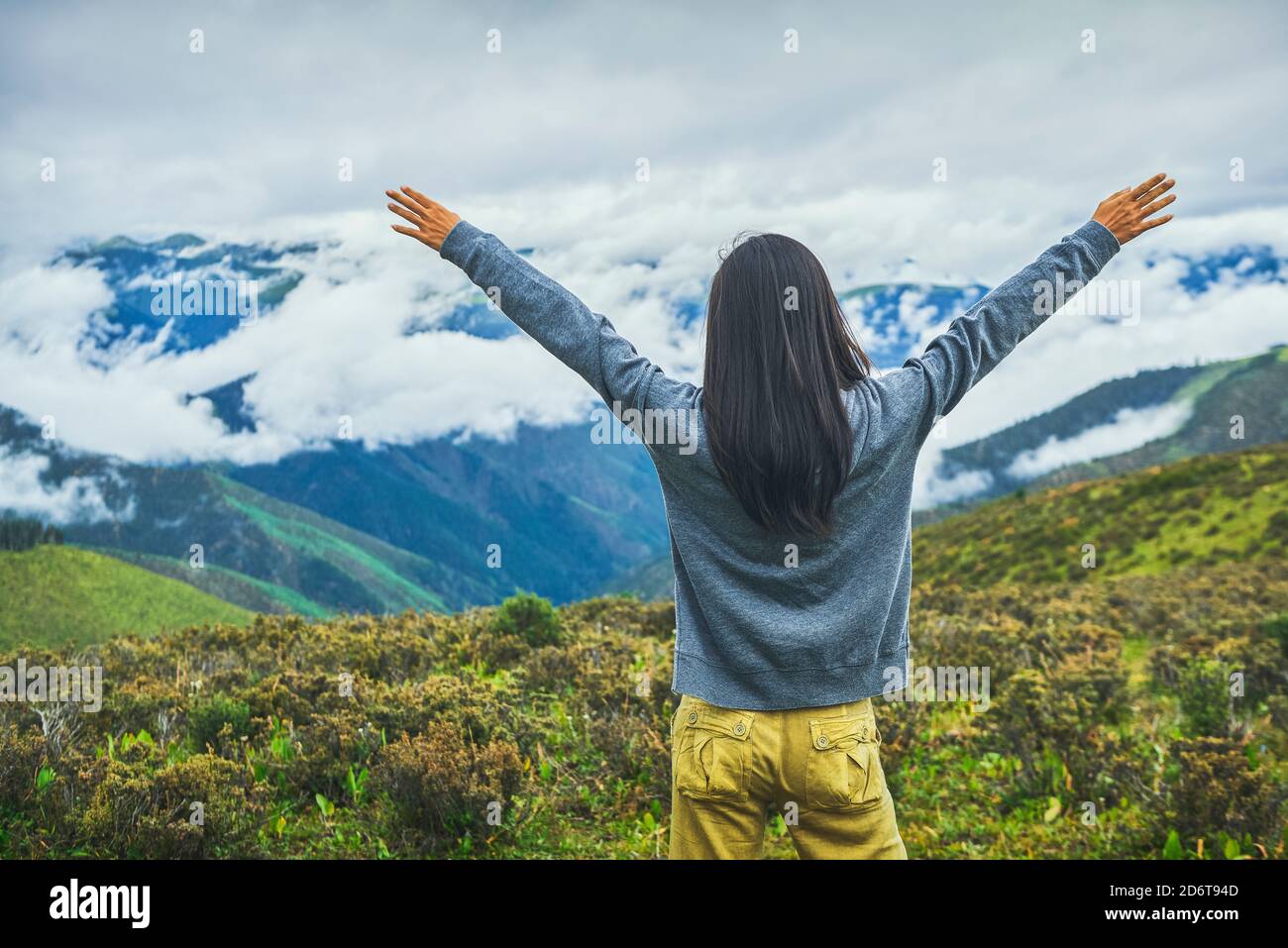 Back view female ethnic hiker hi-res stock photography and images - Alamy