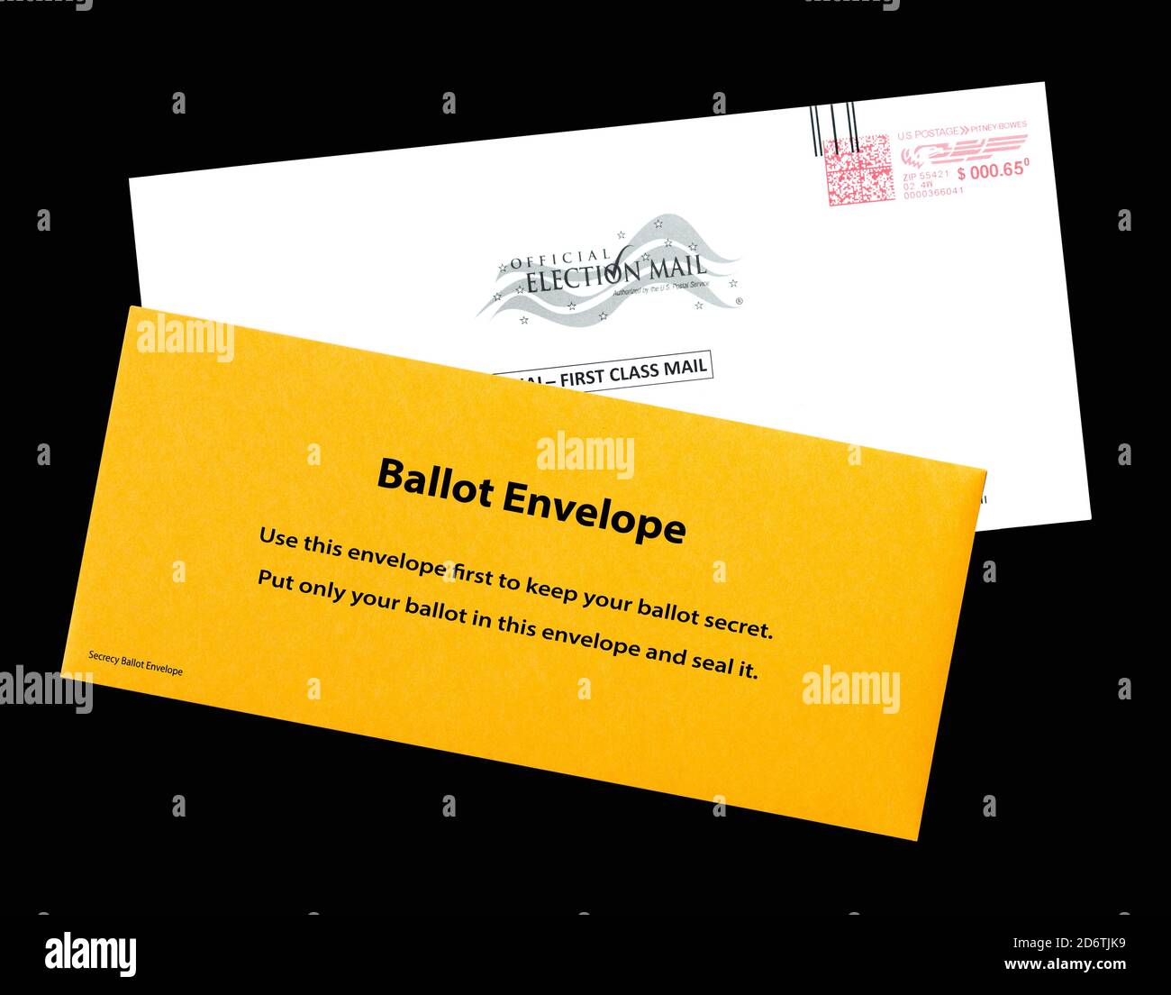 United States absentee secrecy ballot envelope on top of a return envelope used for mailing in or dropping off ballots before general elections Stock Photo