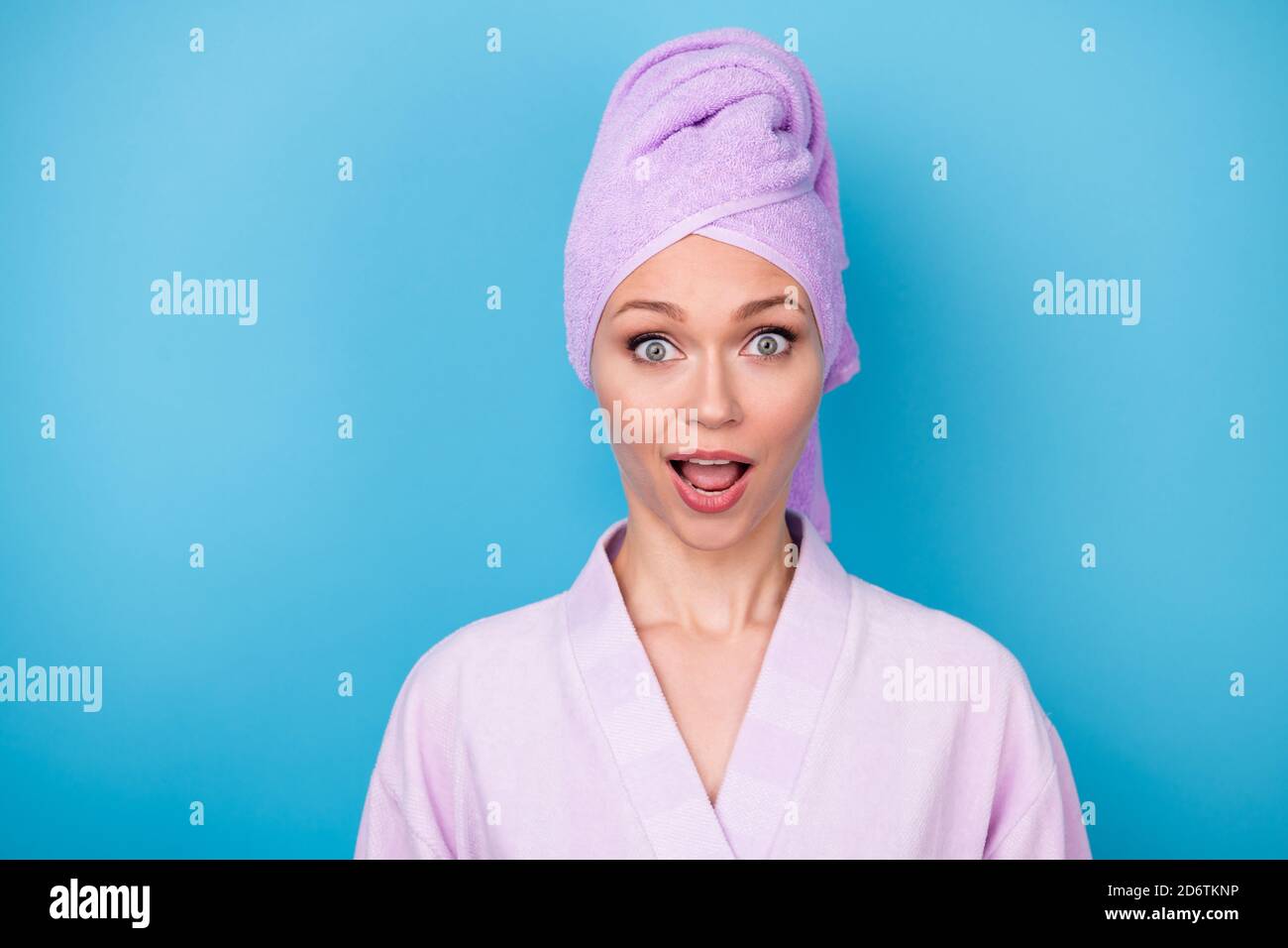 Photo of cute lady open mouth look camera wear violet towel turban bath