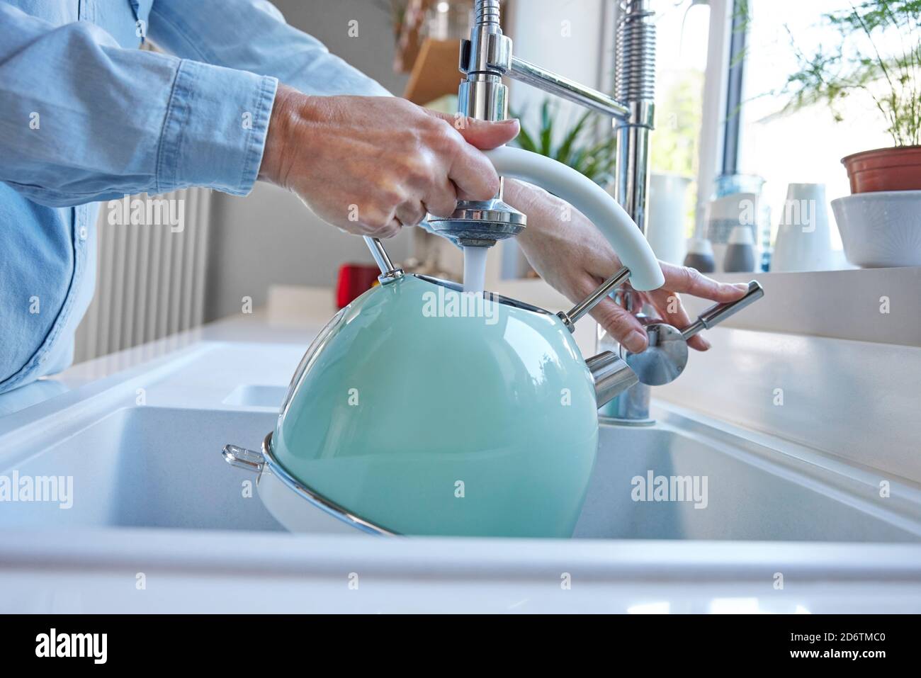 Filling kettle with water hires stock photography and images Alamy