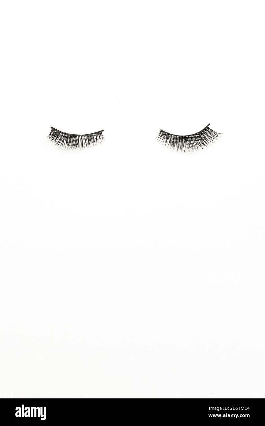Pair of false eyelashes. Artificial Eyelashes on white background Stock Photo