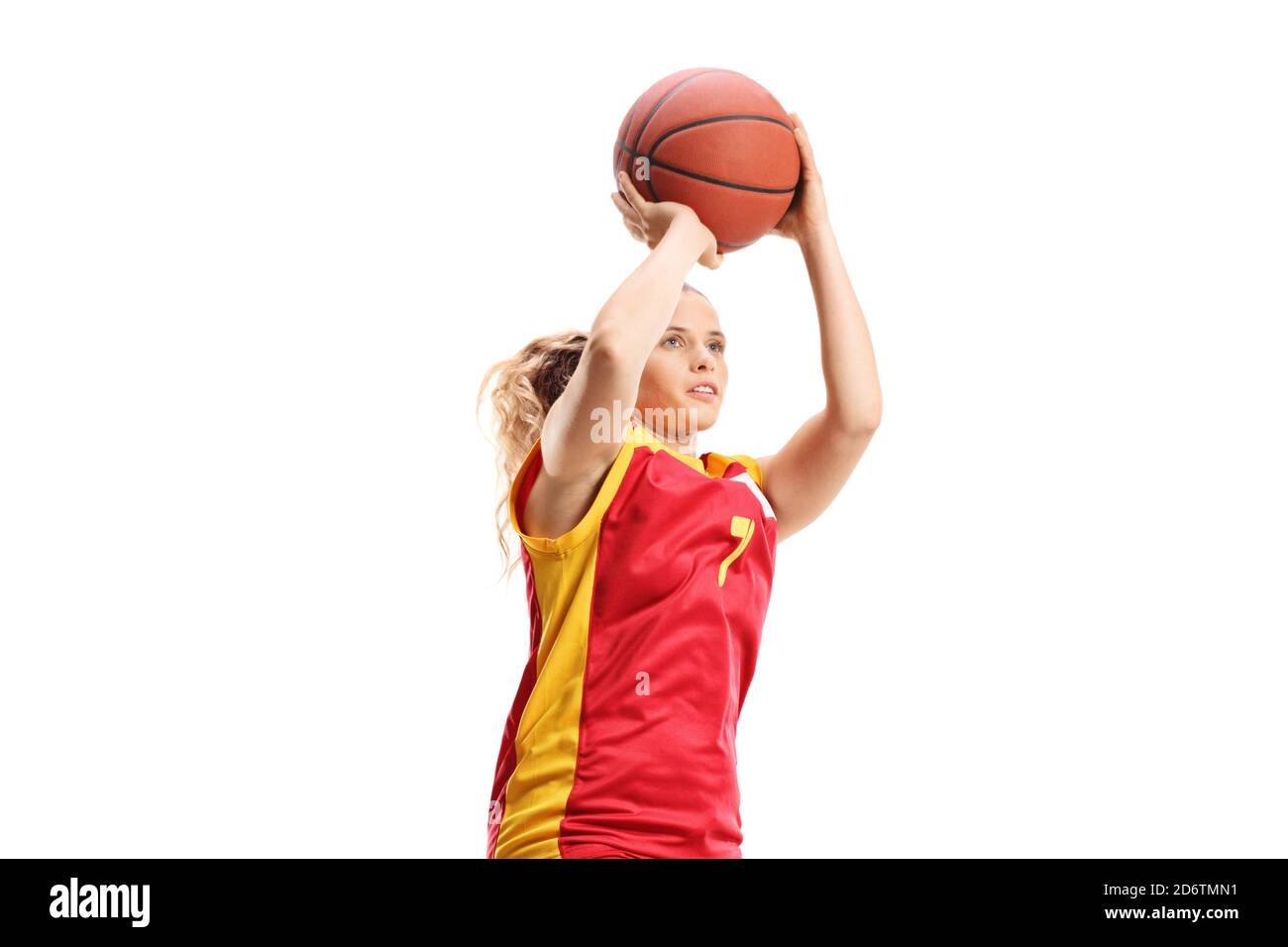 Female basketball player throwing a ball isolated on white background