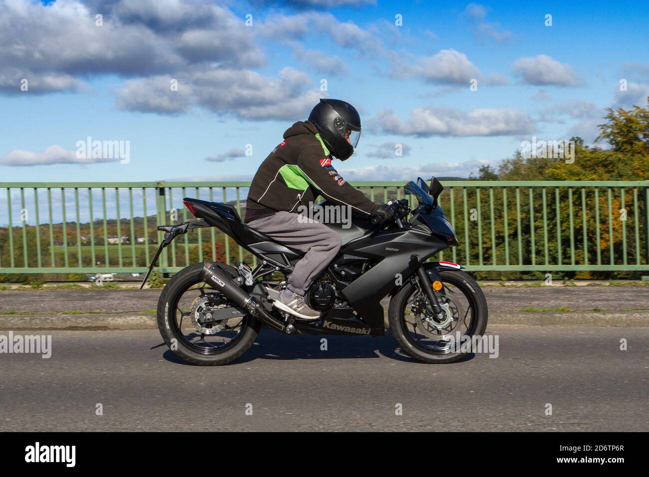 Kawasaki Ninja 125cc Chorley Motorbike rider; two wheeled transport,  motorcycles, vehicle, roads, motorbikes, bike riders crossing motorway  bridge UK Stock Photo - Alamy